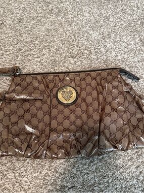 Gucci Brown Monogram Patent Leather Clutch with Gold Emblem